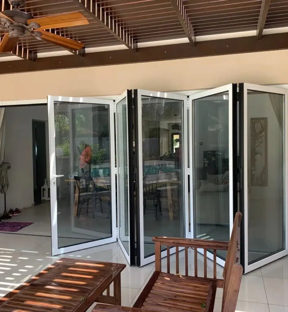 Aluminium bifold doors with flush threshold and access